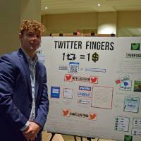 Adam Froude with his poster presentation